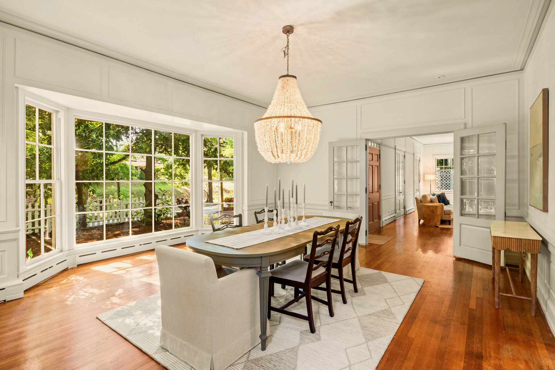 Formal dining room renovation with statement chandelier